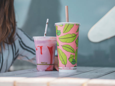 compostable pla smoothie cup and paper cold cup with colourful artist print paper straws