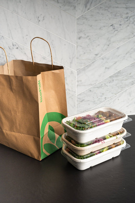 rectangular takeaway bowl and recyclable lid stacked up ready for delivery